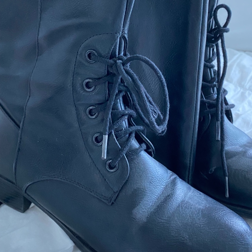 Melina, 8, Black boots.